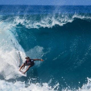 Person surfing on a big wave