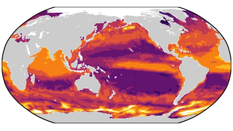 World map image with oceans colored in gradients from yellow to red mapping relative abundance of carbon-eating microbes.