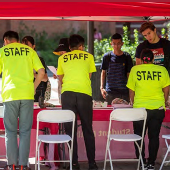 Staff members working event