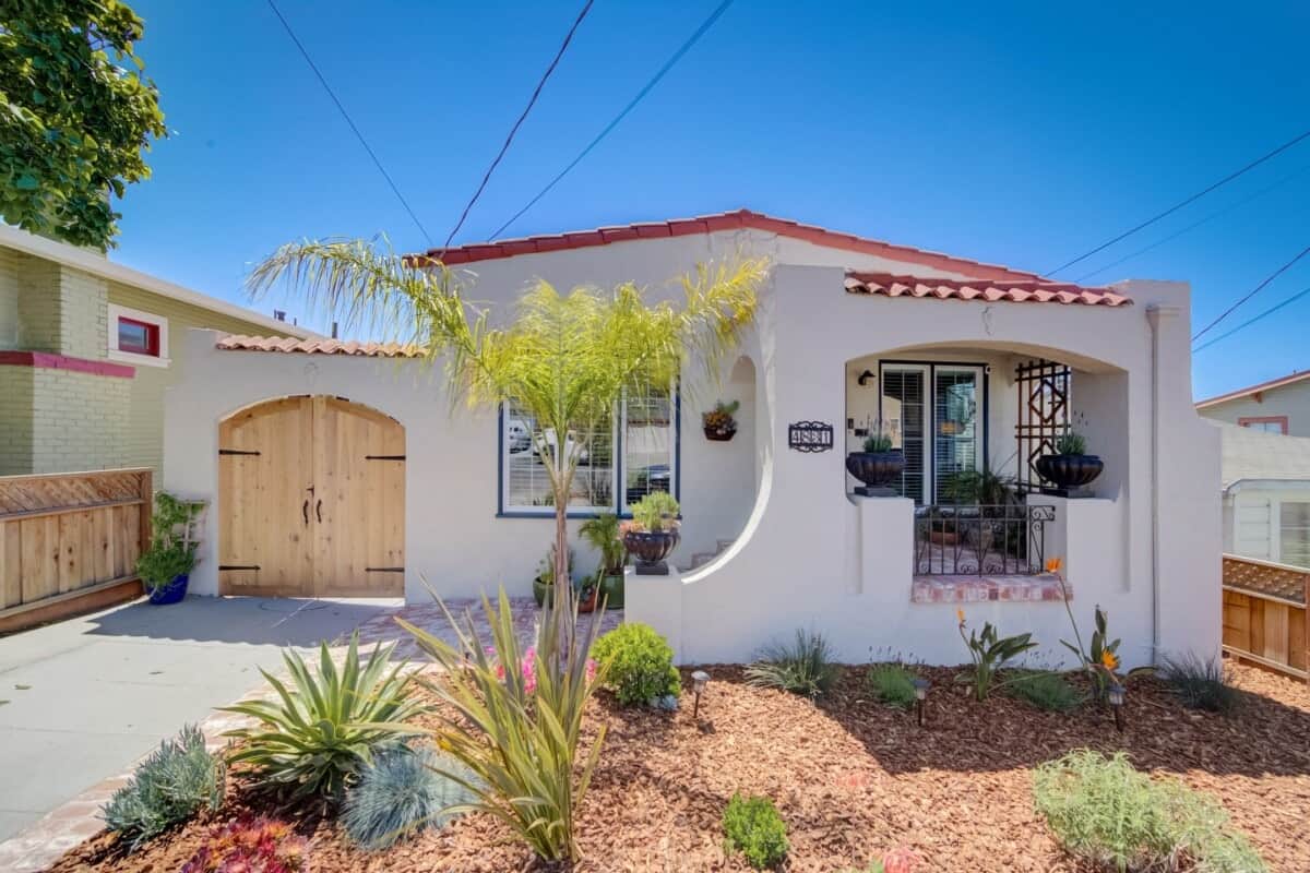 spanish colonial home with white exterior